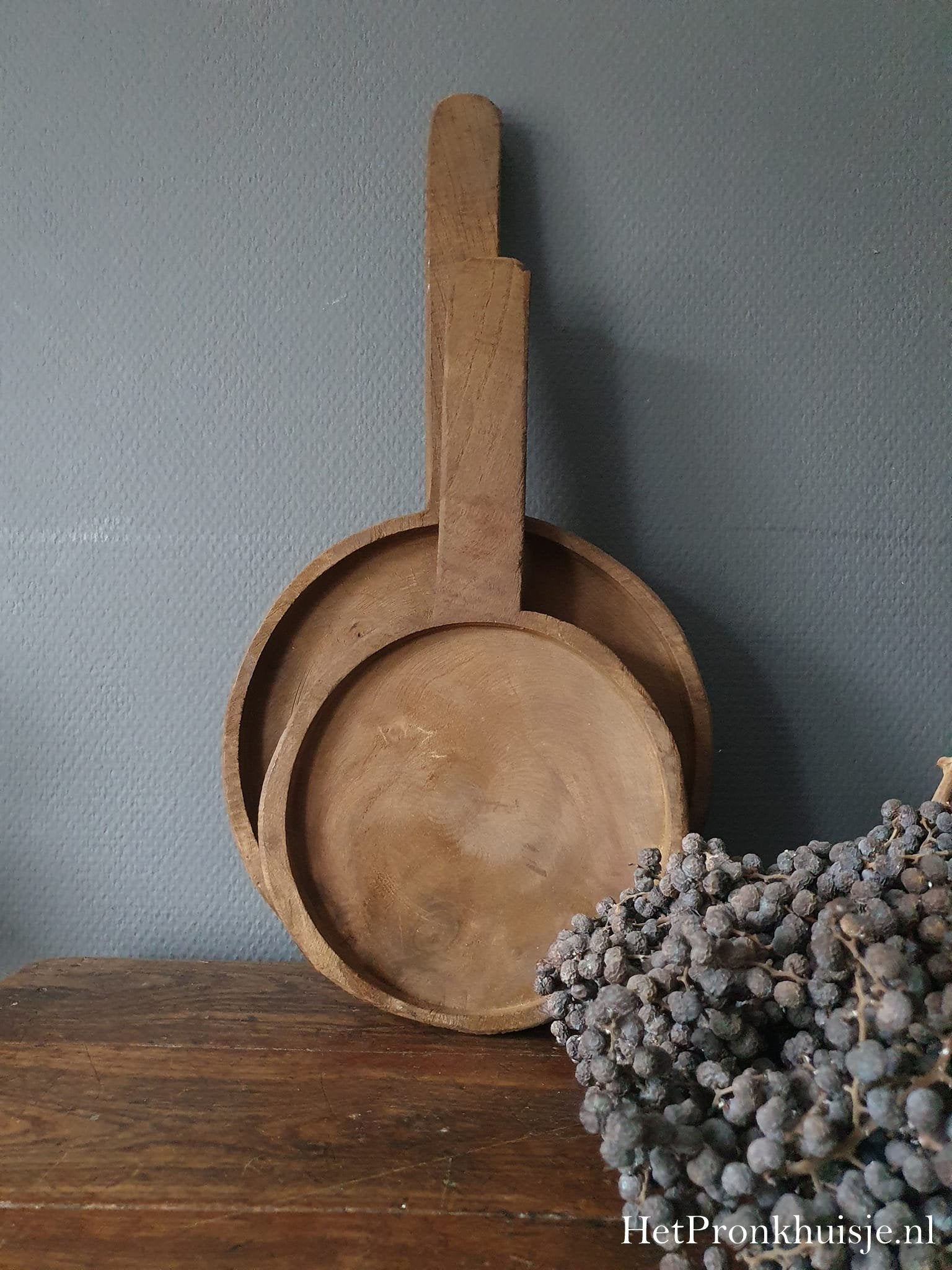 Houten onderzetter plank met greep.