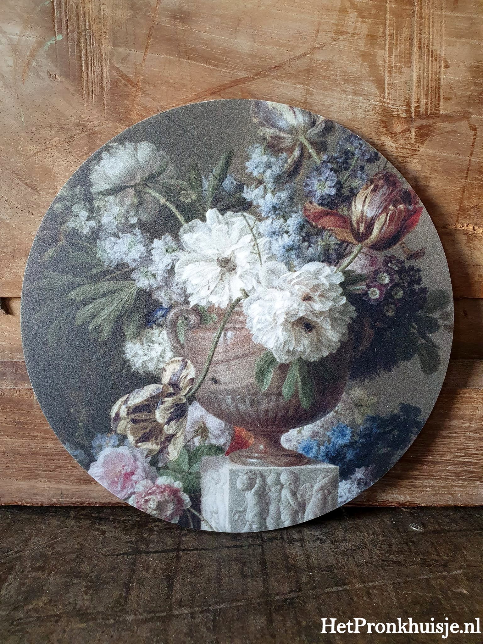 Muurcirkel. Bloemen in bokaal.