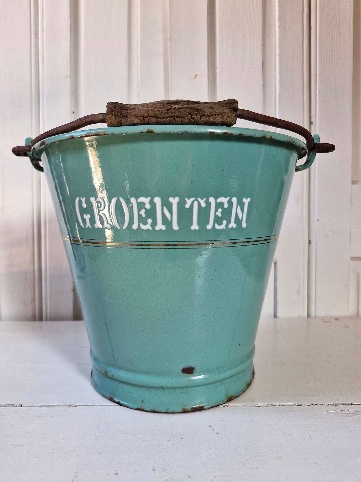 Turquoise emaille groenten emmer