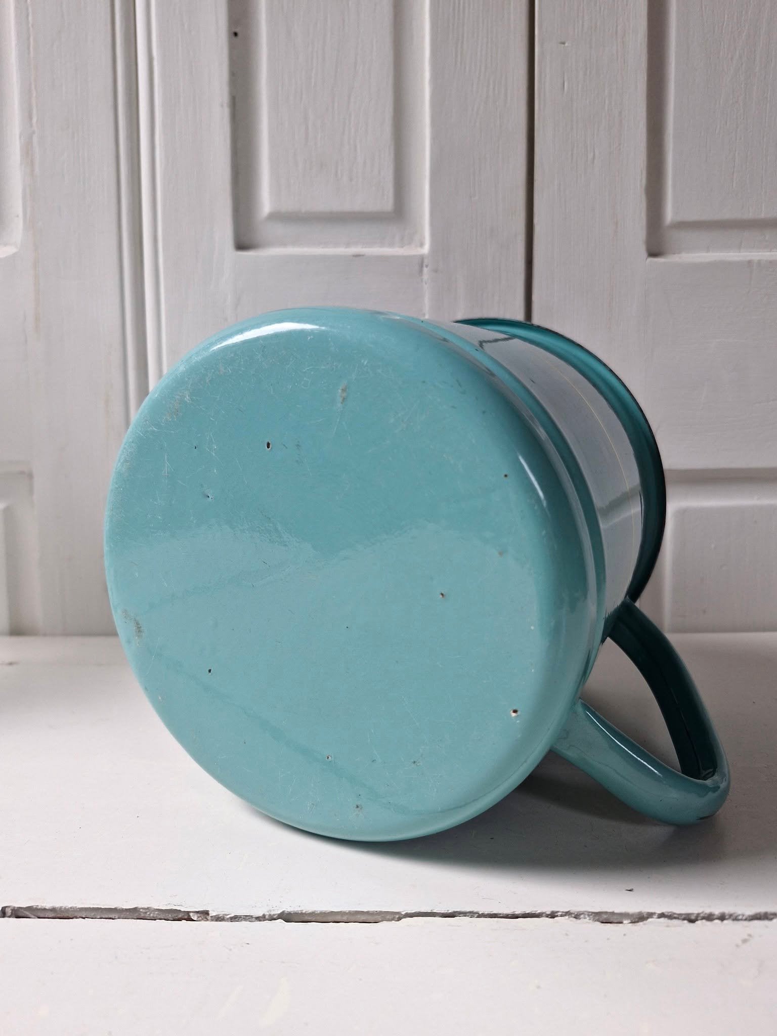 Turquoise emaille melkkoker