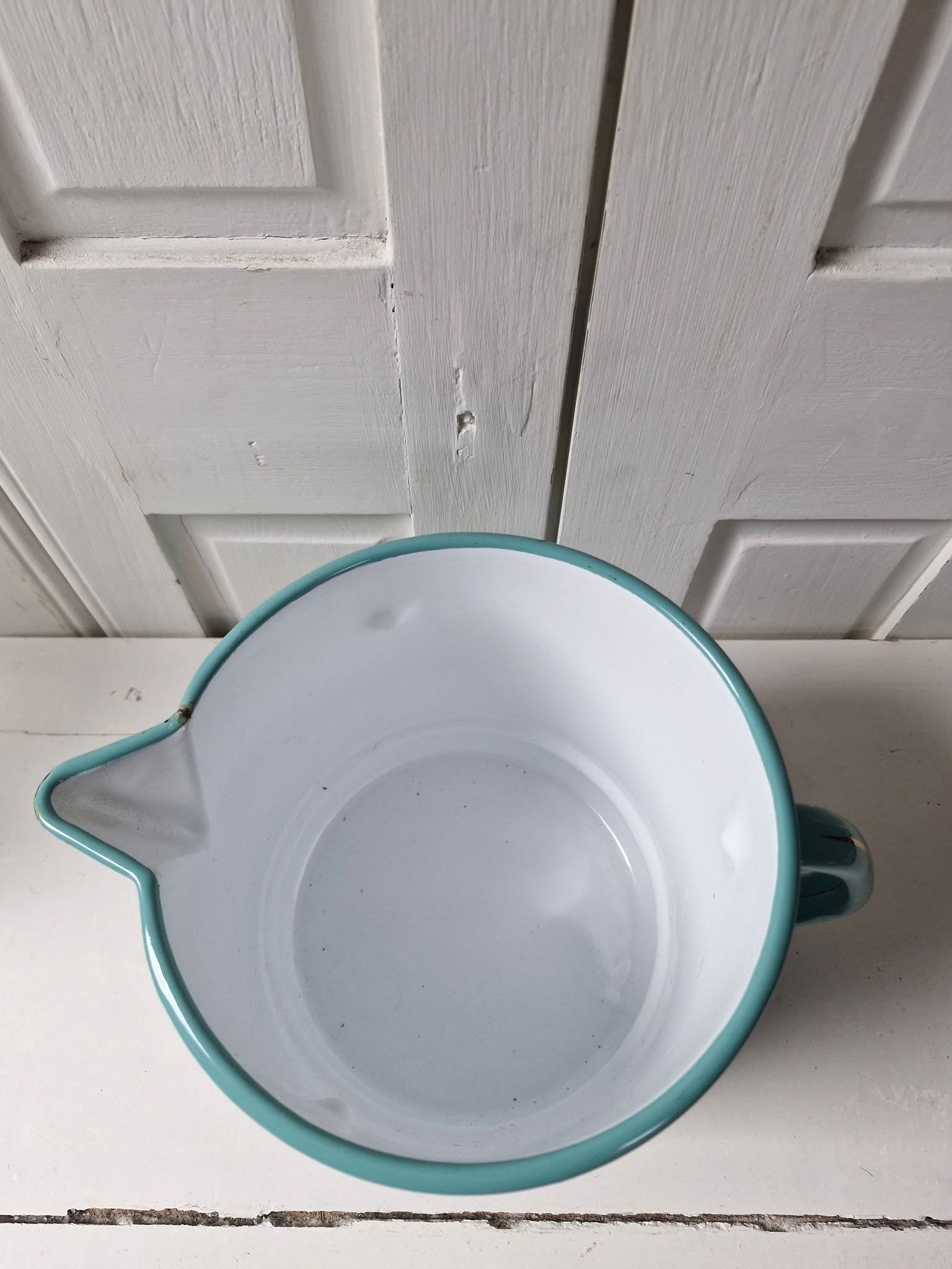 Turquoise emaille melkkoker