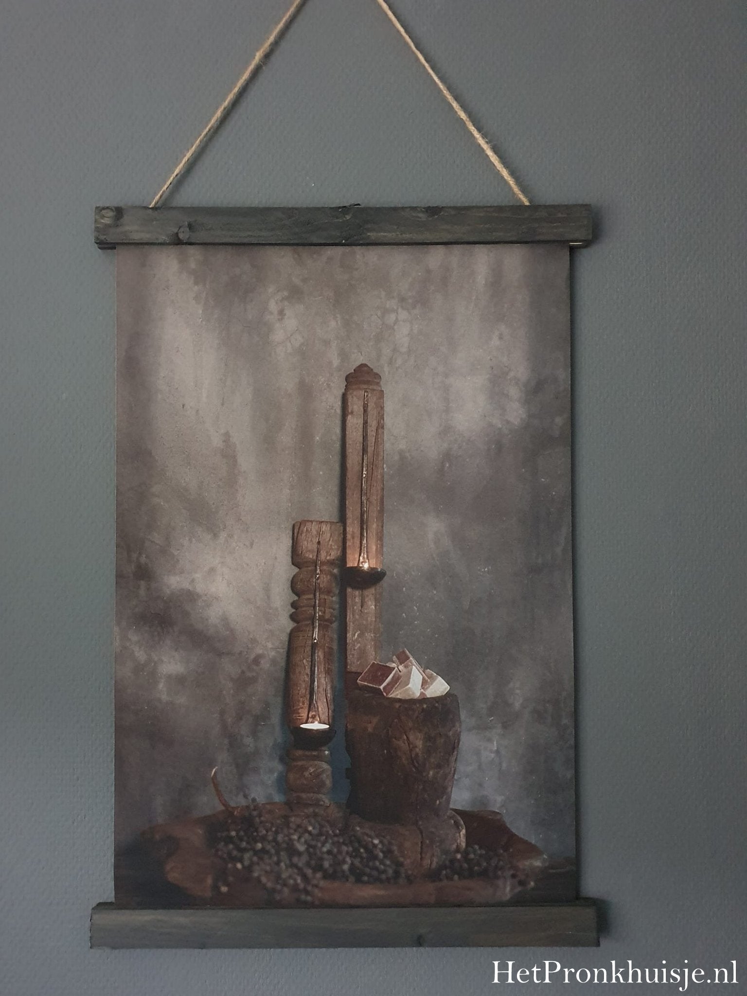 Wanddoek. Kandelaar lepel.