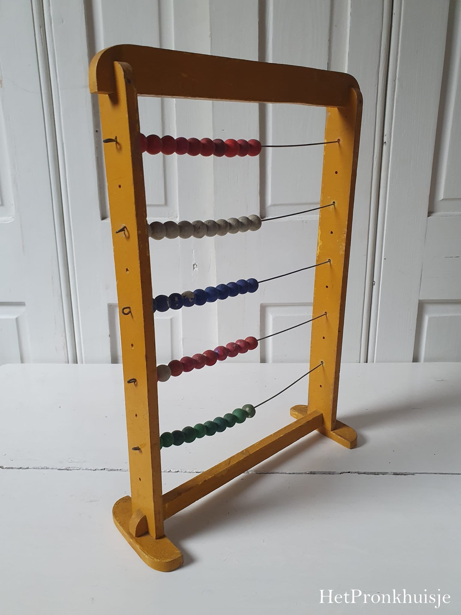 Vintage geel telraam
