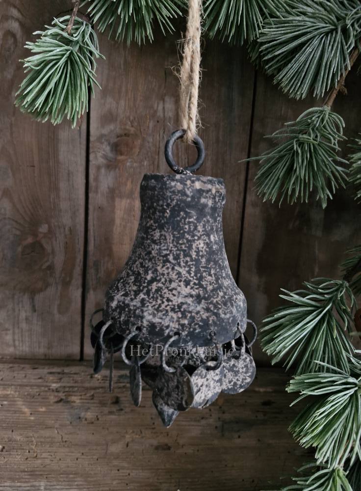 Metalen ornament met schijfjes