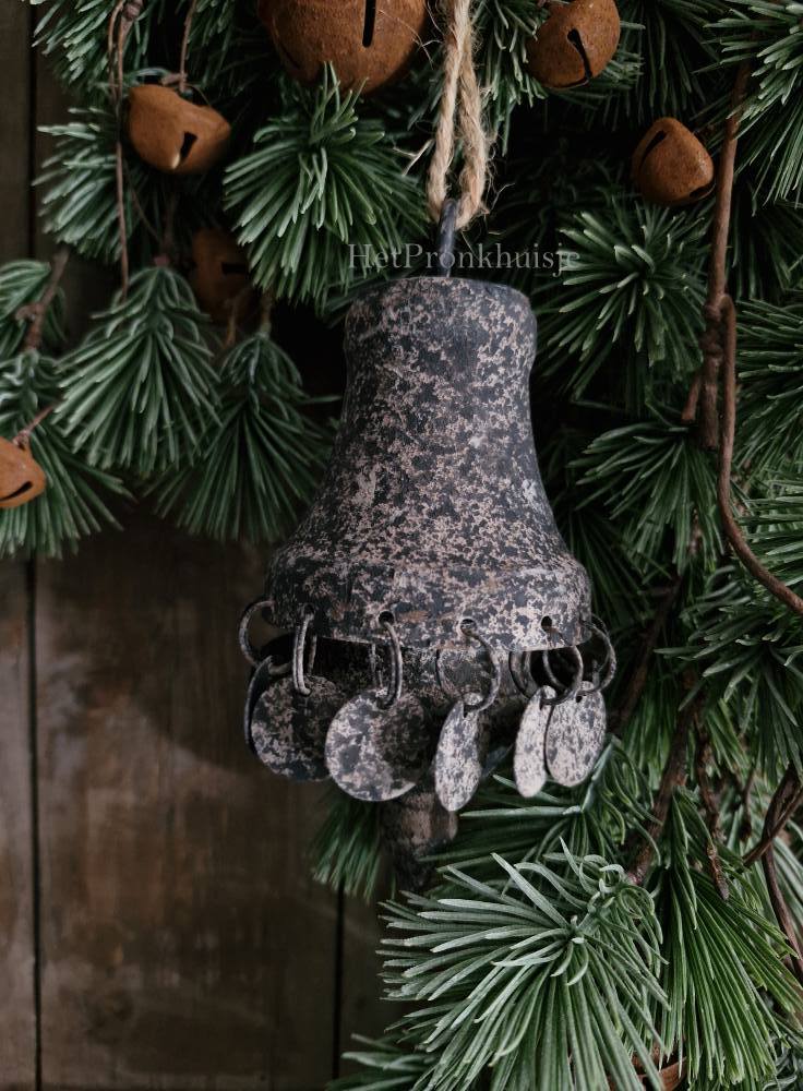 Metalen ornament met schijfjes
