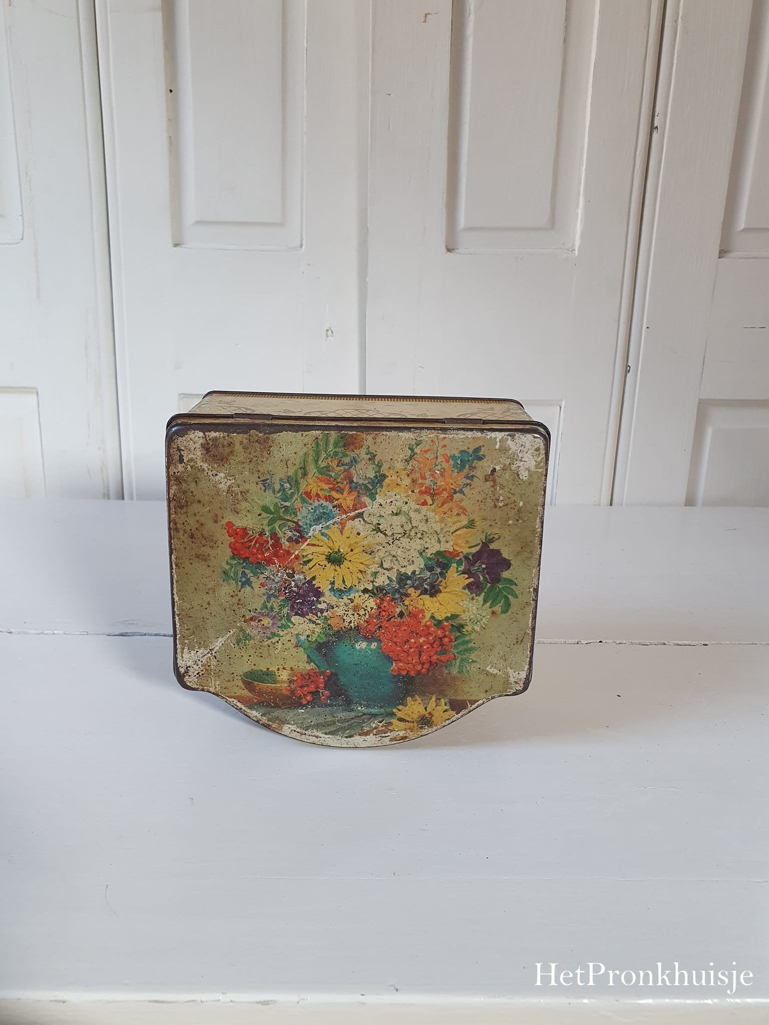 Oud blik met bloemen