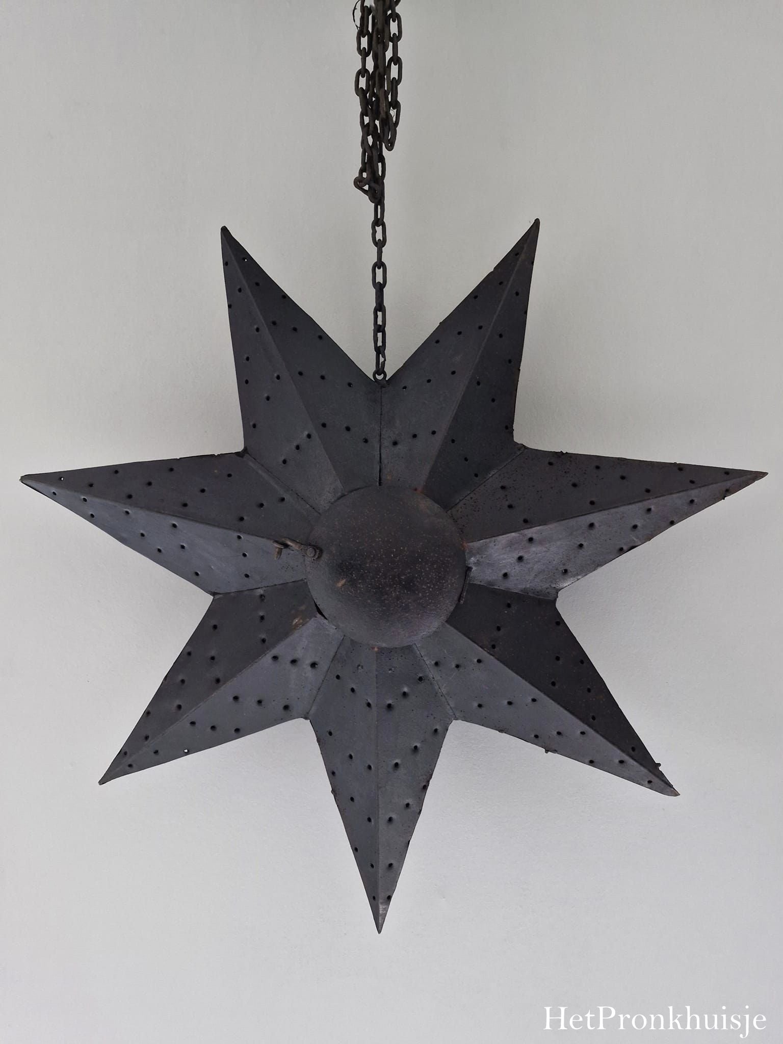 Roest metalen ster aan ketting. XL